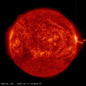 The sun glows orange and chaotic in this colorized photo of a solar eruption on May 13, 2025